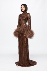 Long sleeved dress in chocolate with feather applications