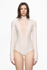White bodysuit with a deep V-neck
