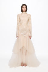Long sleeved dress in vanilla with asymmetrical skirt