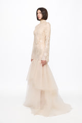 Long sleeved dress in vanilla with asymmetrical skirt