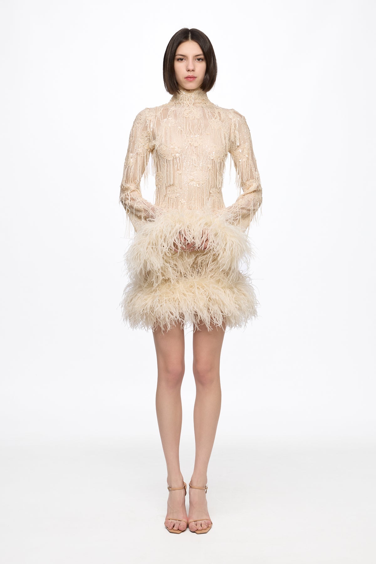 Mini dress in vanilla with feather applications