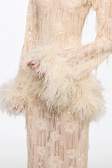 Long sleeved dress in vanilla with feather applications