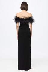 Black dress with open shoulders and feathers